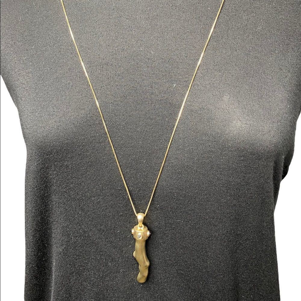 Chicos gold pendant with black and white crystals adjustable 18” -22” chain